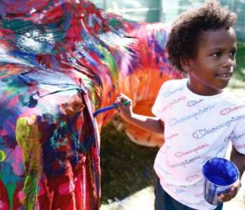 child painting color statue child painting color statue